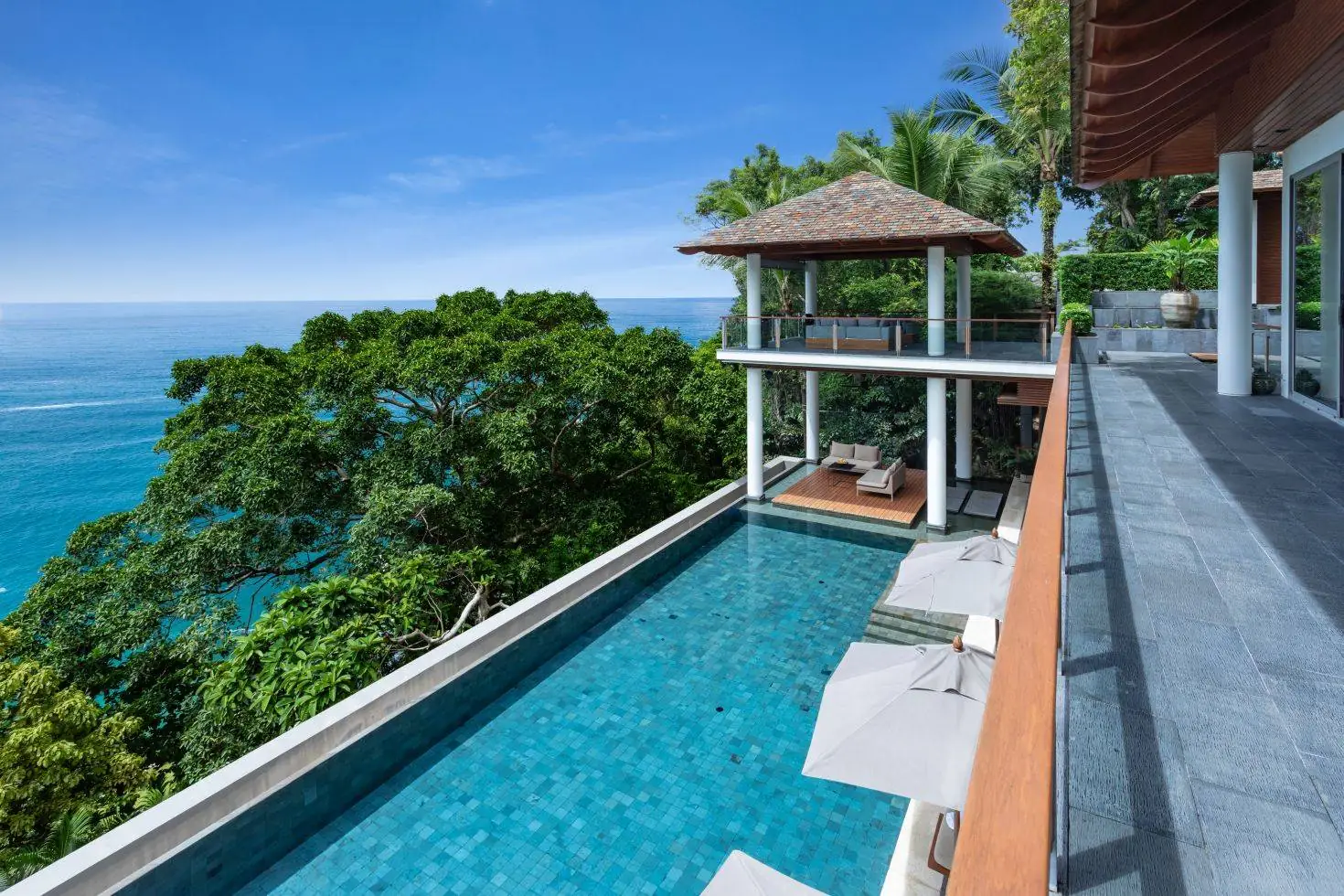 The infinity pool and the ocean-view sala pavilion at Baan Banyan Villa, Kamala
